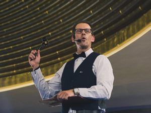 Live Auctioneer for Fundraising Auctions Richard Ernster in action auctioning in Singapore.